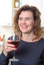 Blue eyes woman drinking a glass of wine Royalty Free Stock Photo