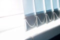 Blue fabric blinds on the window close up Royalty Free Stock Photo