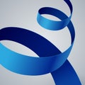 Blue fabric curved ribbon on grey background Royalty Free Stock Photo