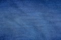 Blue fabric texture of mashed and shabby denim Royalty Free Stock Photo