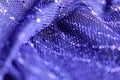 Blue fabric texture with sparkles close-up. Textile background Royalty Free Stock Photo