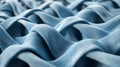 Blue fabric waves with textured pattern. Royalty Free Stock Photo