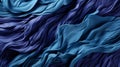 A blue fabric with wavy folds