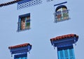 Windows in the historic part of Chefchaouen. Royalty Free Stock Photo