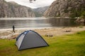 Blue family tent on the beach in Forsand, Lysebotn on cloudy day Royalty Free Stock Photo