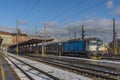 Blue fast motor engine train from Brno to Plzen in main station Brno in winter