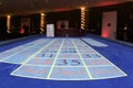 Blue felt roulette table in a casino.