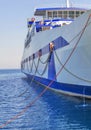 Blue ferryboat for the transport of people and cars Royalty Free Stock Photo