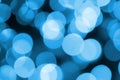 Blue Festive Christmas elegant abstract background with many bokeh lights. Defocused artistic image Royalty Free Stock Photo