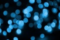 Blue Festive Christmas elegant abstract background with many bokeh lights. Defocused artistic image Royalty Free Stock Photo