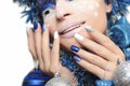 Blue festive manicure.
