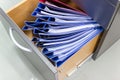 Blue file folder documents In a file cabinet retention Royalty Free Stock Photo