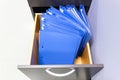 Blue file folder documents In a file cabinet retention Royalty Free Stock Photo