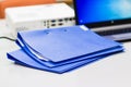 Blue file folder with documents on the white table Royalty Free Stock Photo