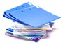 Blue file folder with documents on the white table Royalty Free Stock Photo