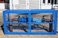 Blue Fire Hydrant in Blue Steel Cage