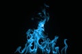 Blue Fire isolated on a black background. Royalty Free Stock Photo