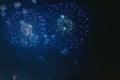 Blue fireworks celebration over the city Royalty Free Stock Photo