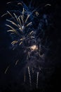 Blue Fireworks in the night sky with sparks and smoke Royalty Free Stock Photo