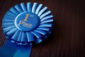 Blue first place winner rosette Royalty Free Stock Photo