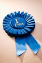 Blue first place winner rosette Royalty Free Stock Photo