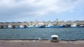 Blue fishing boats lie in scheveningen harbor