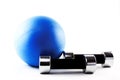 Blue fitness ball with silver hand weights