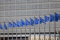 Blue flags of Europe in front of Berlaymont, seat of the European Commission, Brussels, Belgium Royalty Free Stock Photo