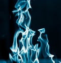 Blue flame fire on a black background Royalty Free Stock Photo