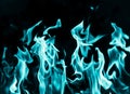 Blue flame fire on black background Royalty Free Stock Photo