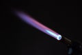 Blue flame. Macro view of a blue flame from a gas torch Royalty Free Stock Photo