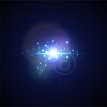 Blue Flash with rays and spotlight. Realistic light glare, high loth, star glow. Lens flare effect on black background. Royalty Free Stock Photo