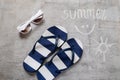 Blue flip flops Text summer on a wooden surface Royalty Free Stock Photo