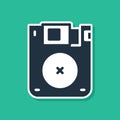 Blue Floppy disk for computer data storage icon isolated on green background. Diskette sign. Vector