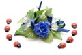 Blue floral decoration with ladybug Royalty Free Stock Photo