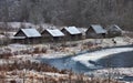 Frozen river. Village in Russia.