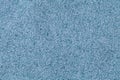 Blue fluffy background of soft, fleecy cloth. Texture of denim wool textile Royalty Free Stock Photo