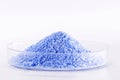 Blue Fluorescent pigments, made up of a polymeric matrix, resins of different types such as polyester, alkyd, formaldehyde which Royalty Free Stock Photo