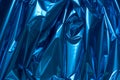 Blue folded metallic foil abstract bacgkground