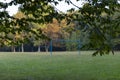 blue football gates in the park in autumn