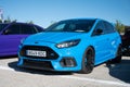 Blue Ford Focus Rs3 parked on the side of a road Royalty Free Stock Photo