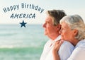Blue fourth of July graphic against elderly couple looking out to sea Royalty Free Stock Photo