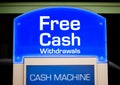 Blue Free Cash Withdrawal sign. Royalty Free Stock Photo