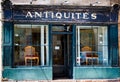 Blue French antique shop front with flaking paint in Beaune, Burgundy Royalty Free Stock Photo