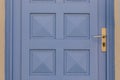 Blue french door with golden handle Royalty Free Stock Photo