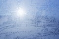 Blue frost pattern on window at winter Royalty Free Stock Photo