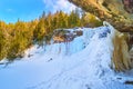 Blue frozen waterfall in winter with snow Royalty Free Stock Photo