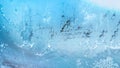Blue frozen window background. Hoar frost on glass. Wallpaper with icy texture on windshield. Snowy windscreen from Royalty Free Stock Photo