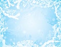 Blue frozen winter background with snowflakes