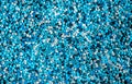 Blue fusible plastic beads used for arts and craft.